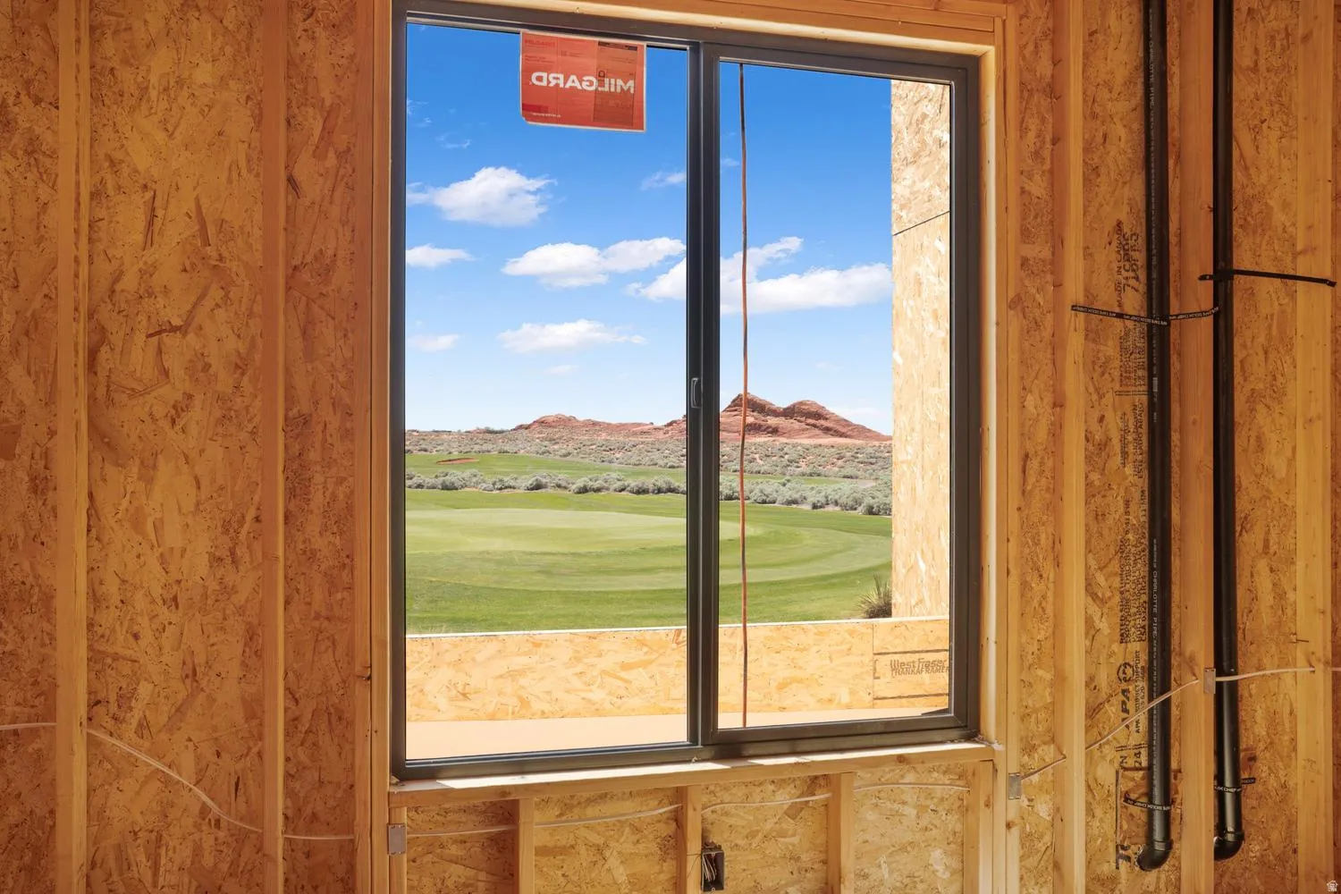 Detailed view of a local golf course and mountains