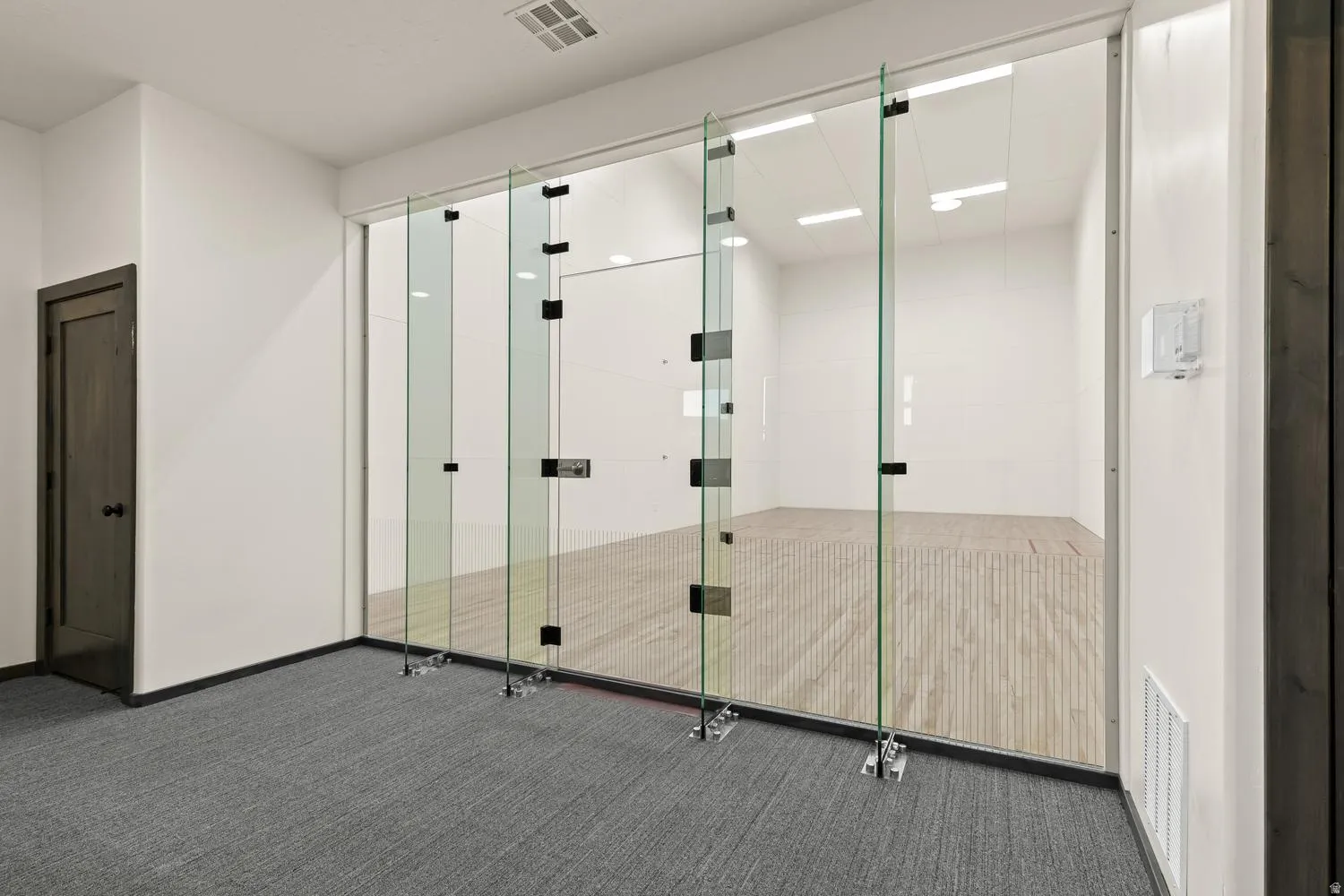Miscellaneous room with a sport court