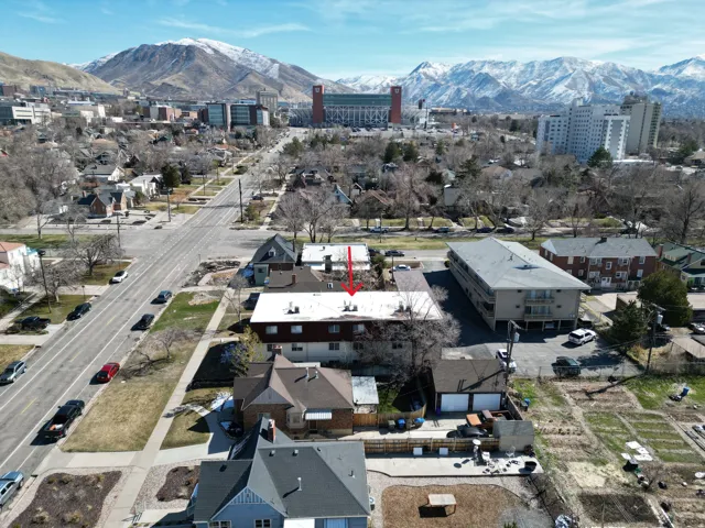 Aerial perspective of suburban area with a mountain backdrop