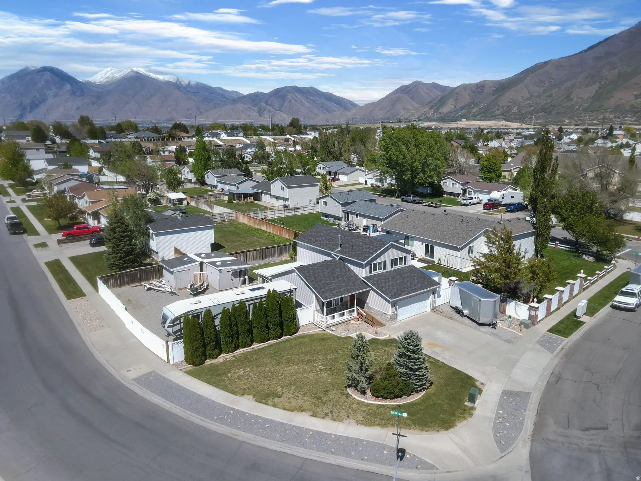 Aerial view of residential area with a mountainous background