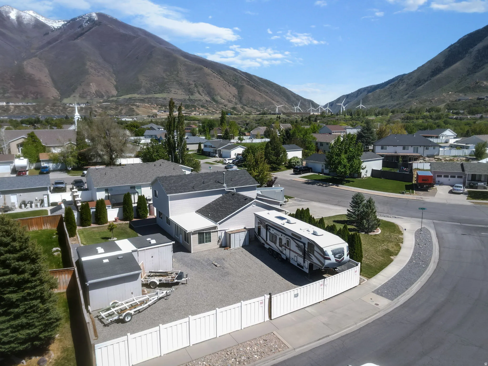 View of mountain background featuring nearby suburban area