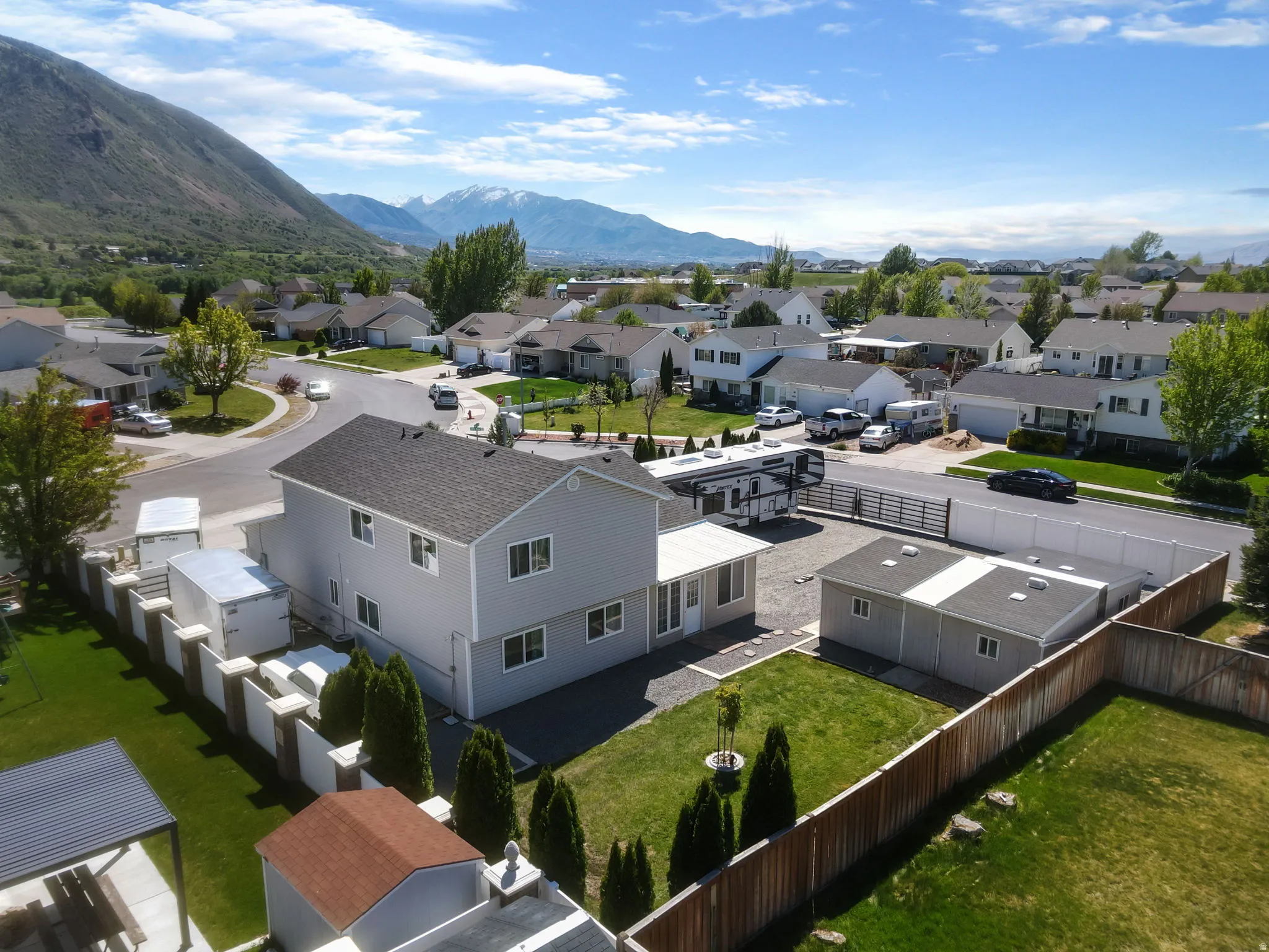 Aerial view of residential area with a mountainous background