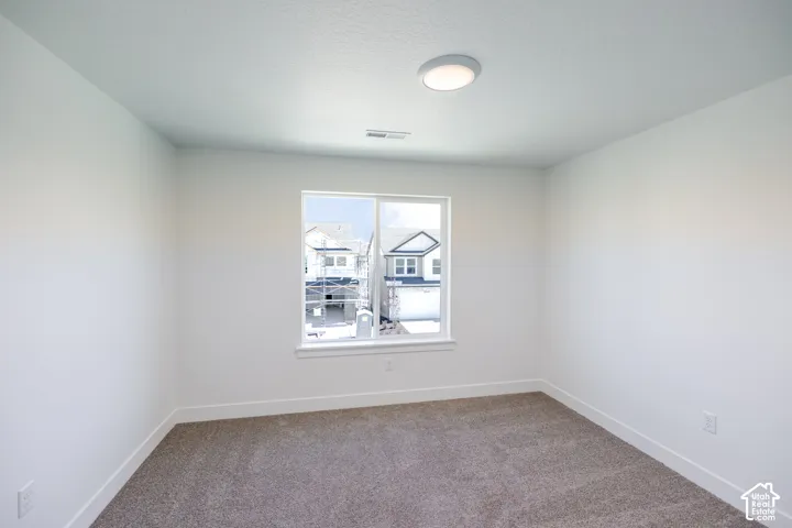 Neutral wall color with a contrasting white trim
