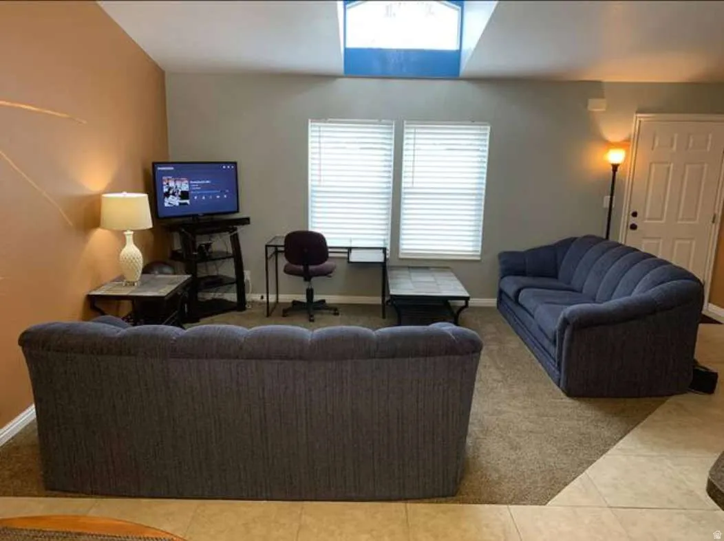 Living area with tile patterned floors