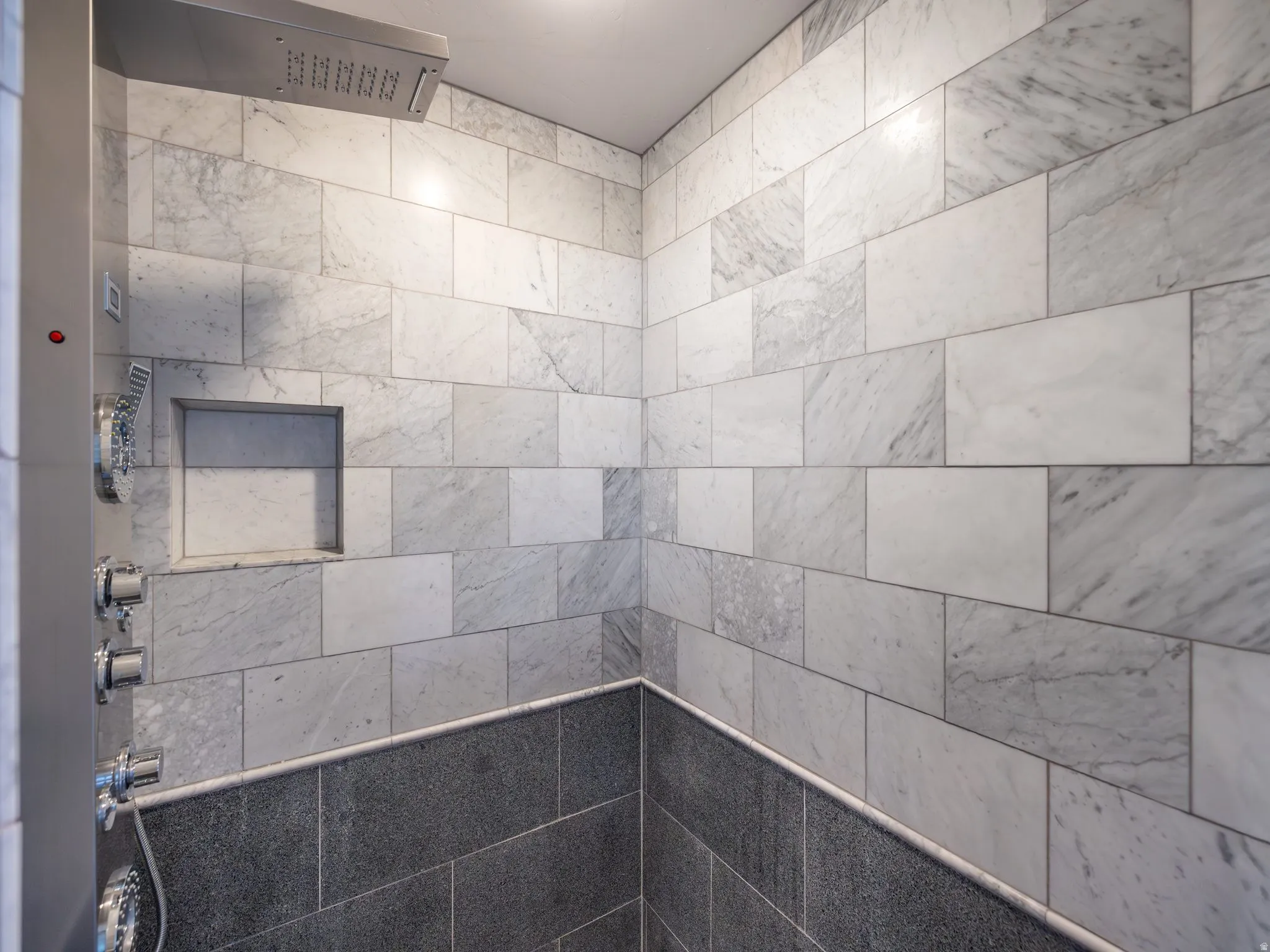 Full bath with tiled shower