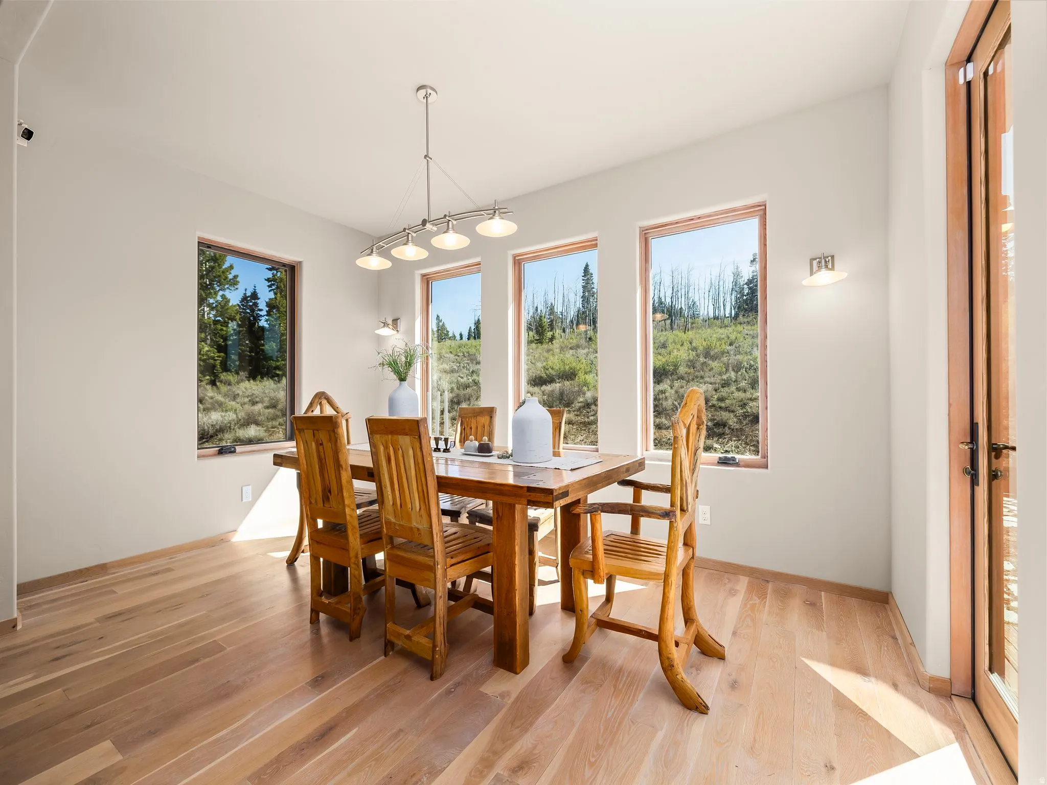 Dining space with light wood-type flooring