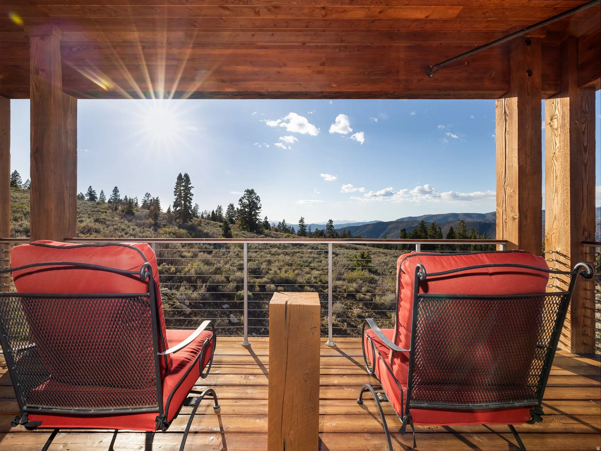 Wooden deck featuring a mountain view