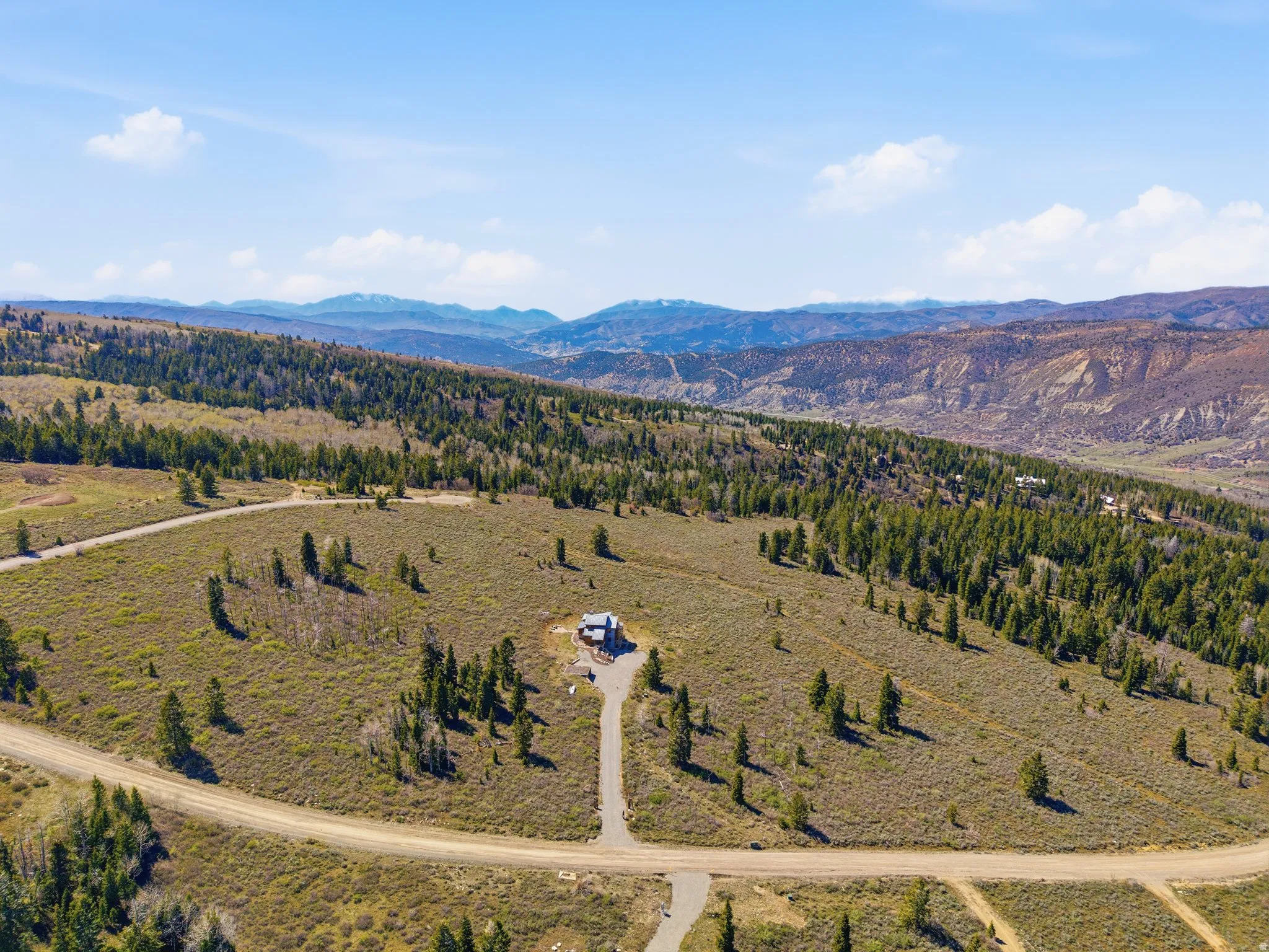 Overview of rural landscape featuring mountains