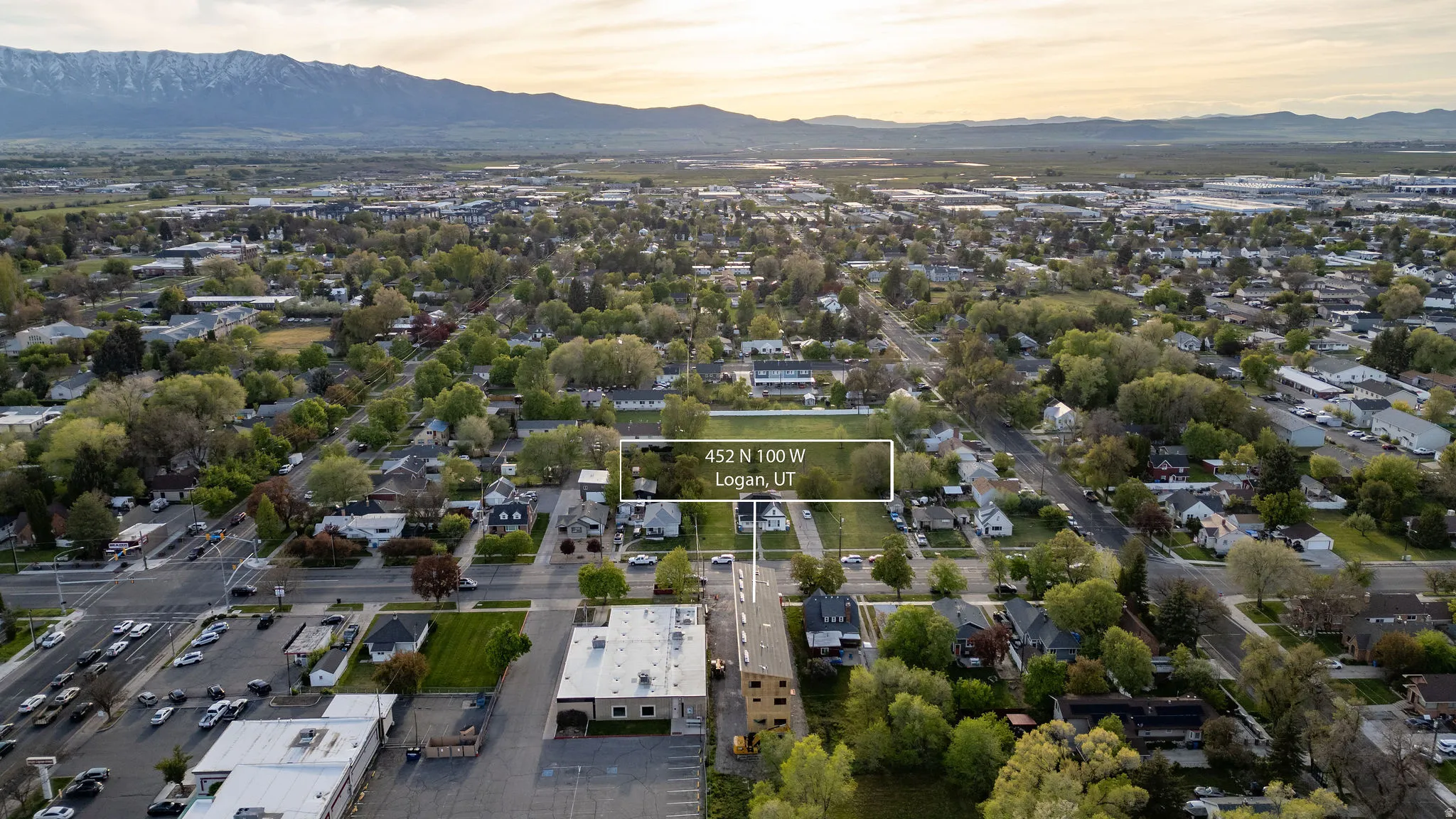 Aerial view of residential area with a mountainous background