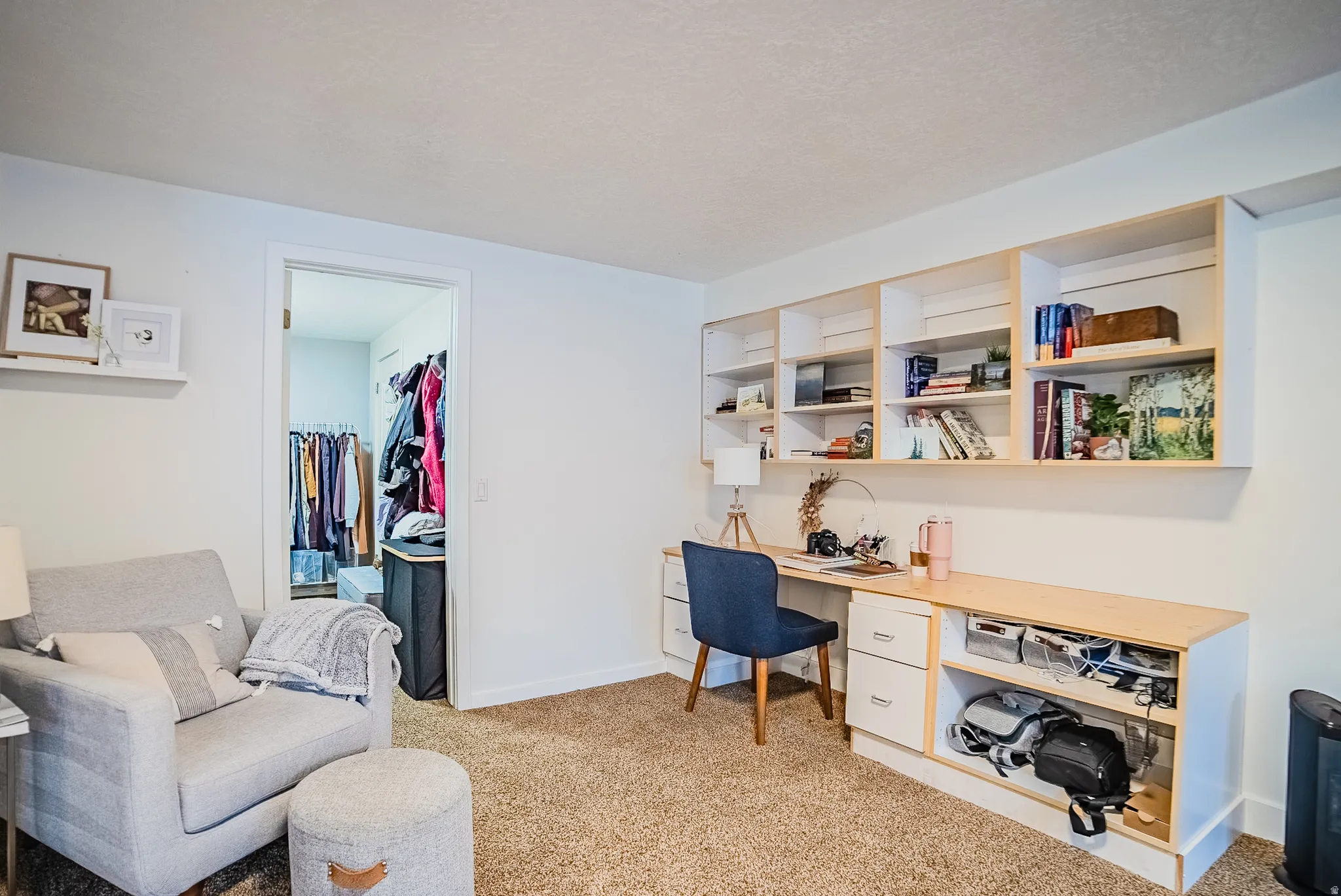 Home office with light colored carpet