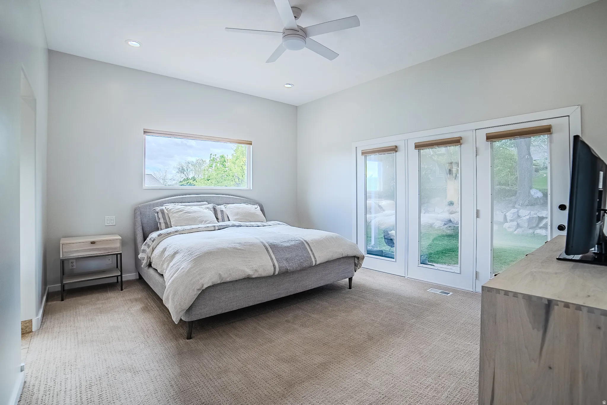 Bedroom with light colored carpet, access to outside, a ceiling fan, and recessed lighting