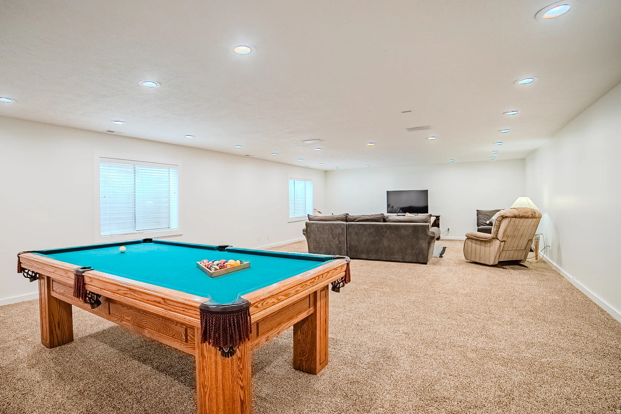 Game room with light colored carpet, billiards, and recessed lighting