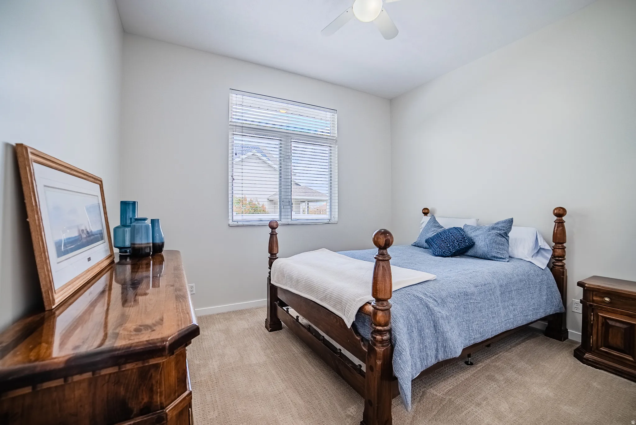Bedroom featuring carpet floors and ceiling fan