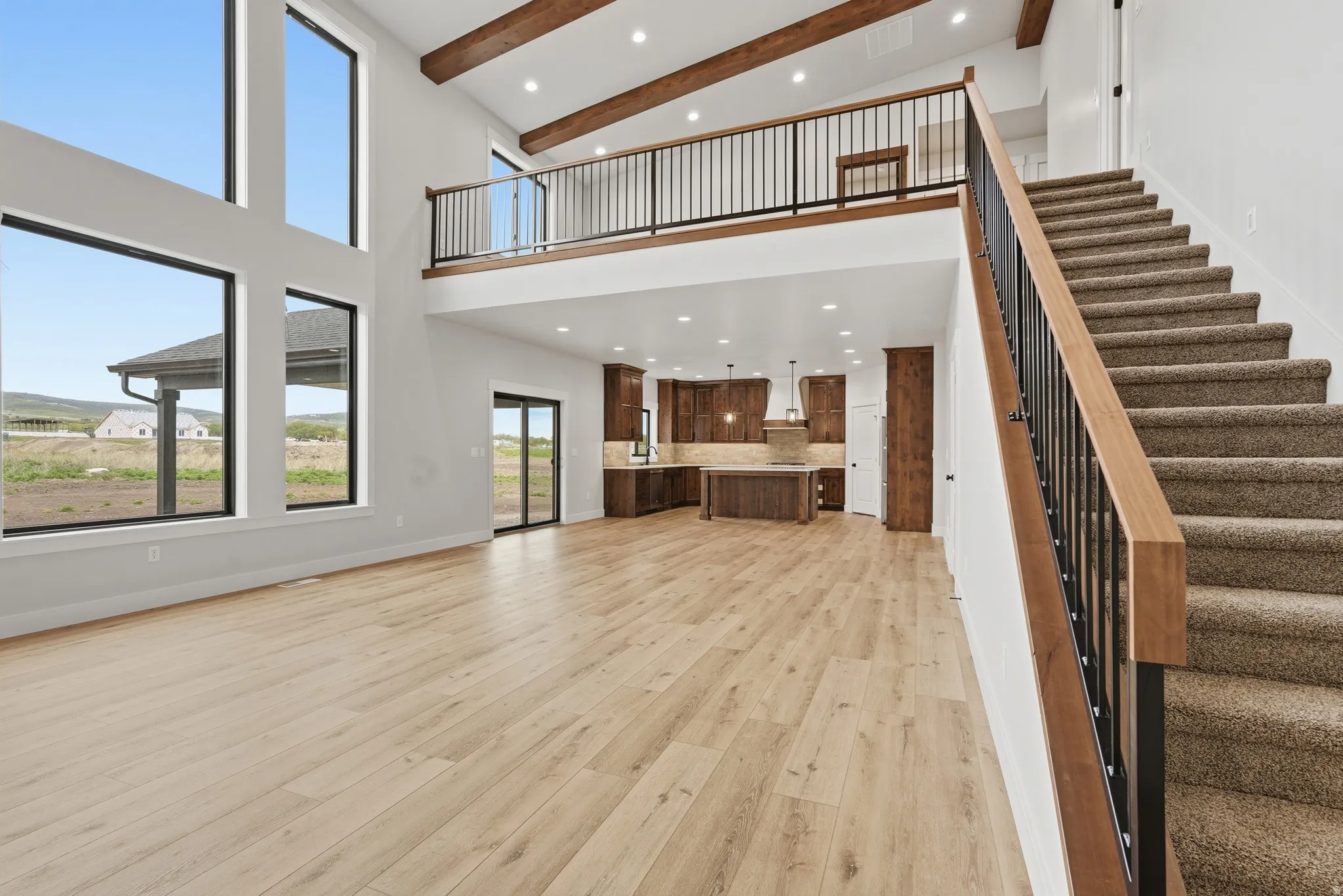 Unfurnished living room featuring recessed lighting and light wood-style floors