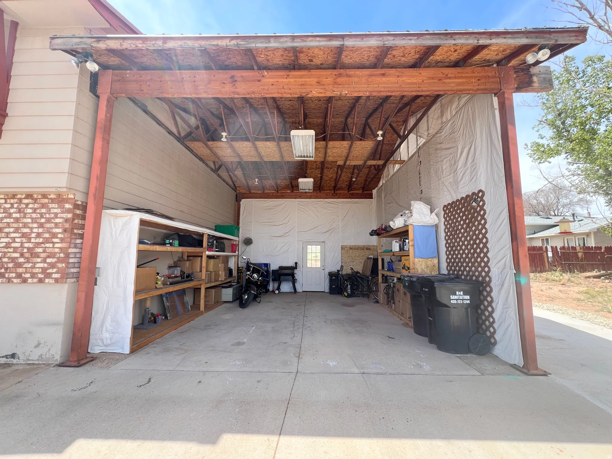 View of garage/enclosed carport