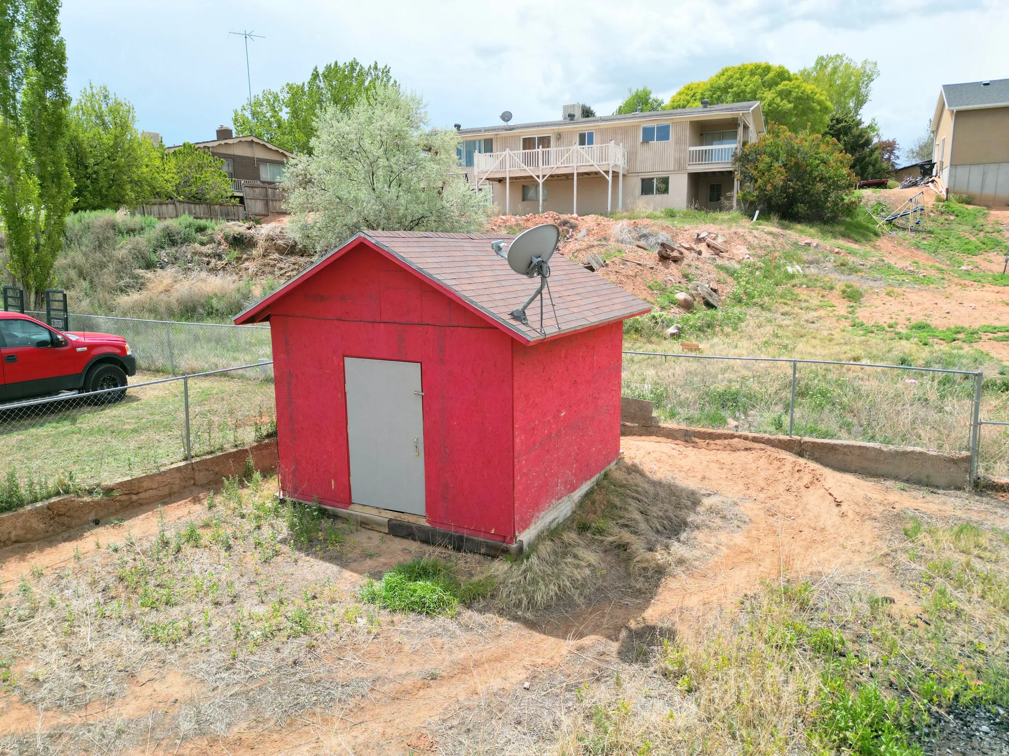 View of shed featuring a fenced backyard