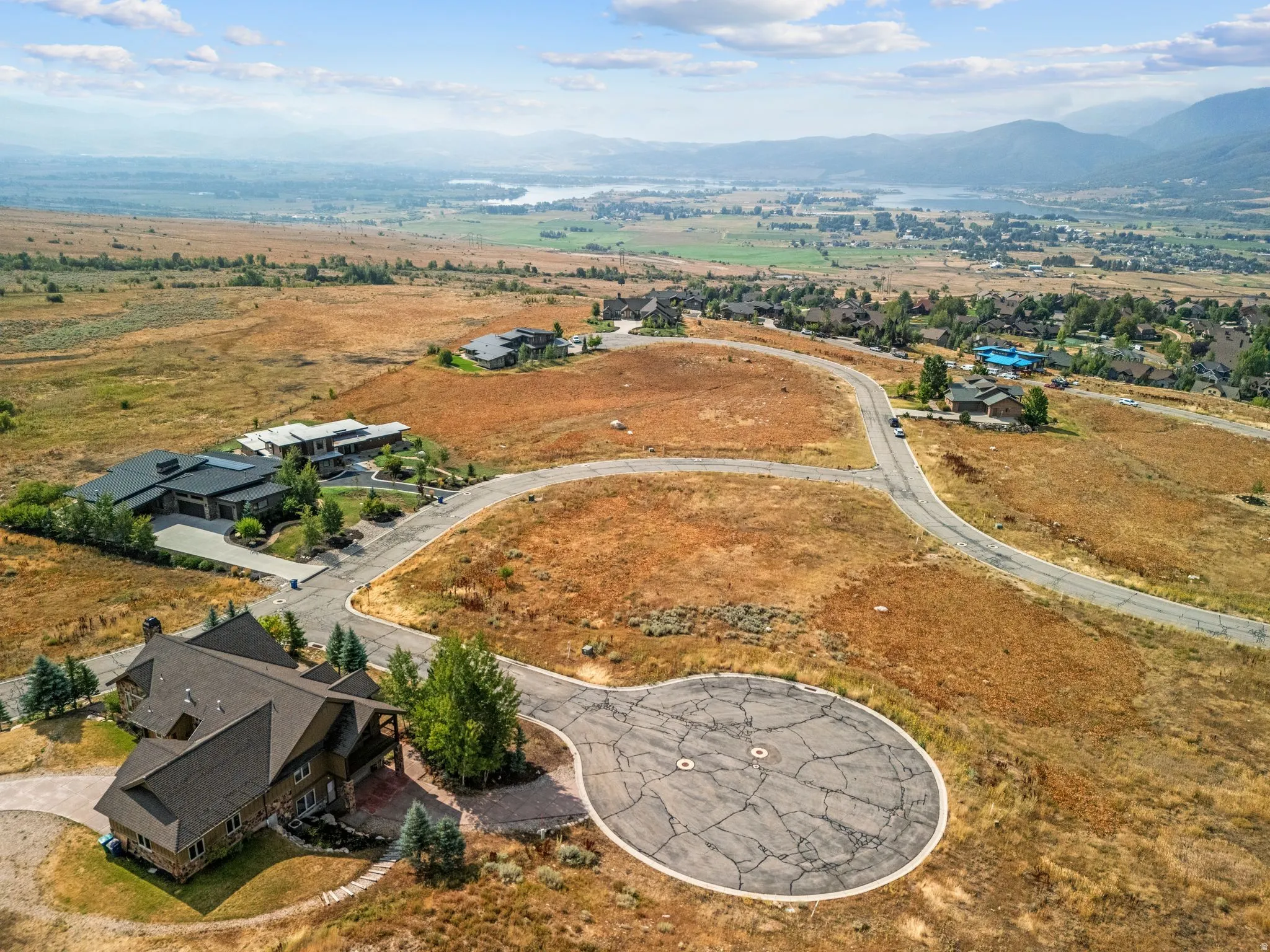 Aerial perspective of suburban area featuring mountains
