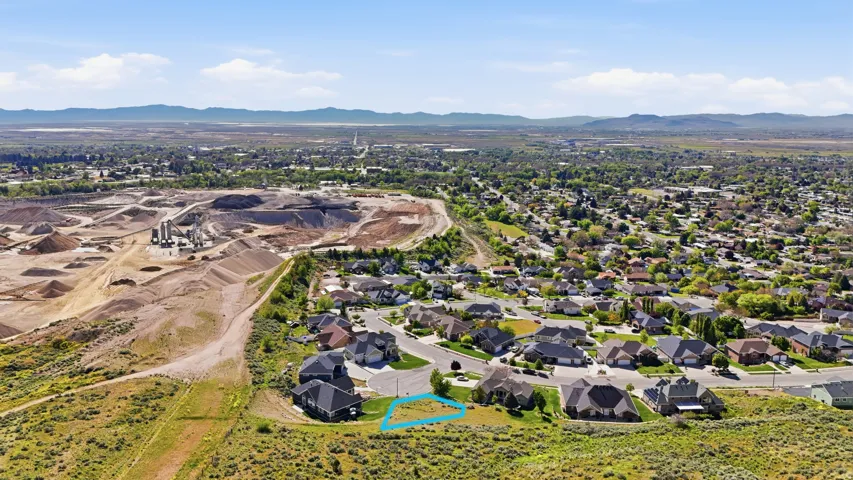 Aerial perspective of suburban area with mountains