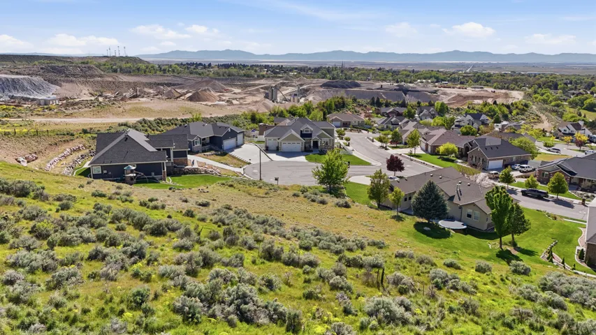 Aerial view of residential area featuring mountains