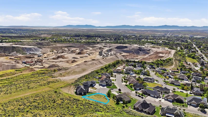 Aerial view of residential area with mountains