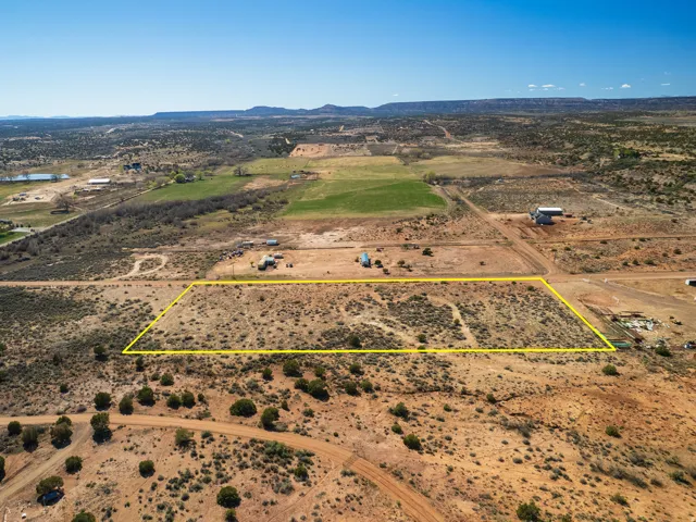View of rural area featuring property parcel outlined and a mountain backdrop