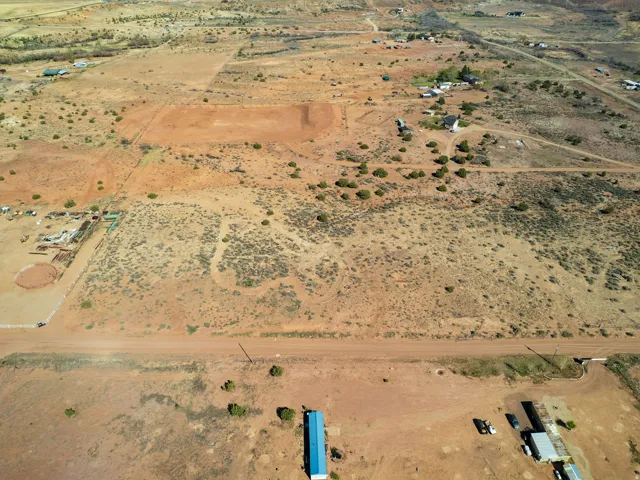 Aerial view of property's location featuring rural landscape and a desert landscape