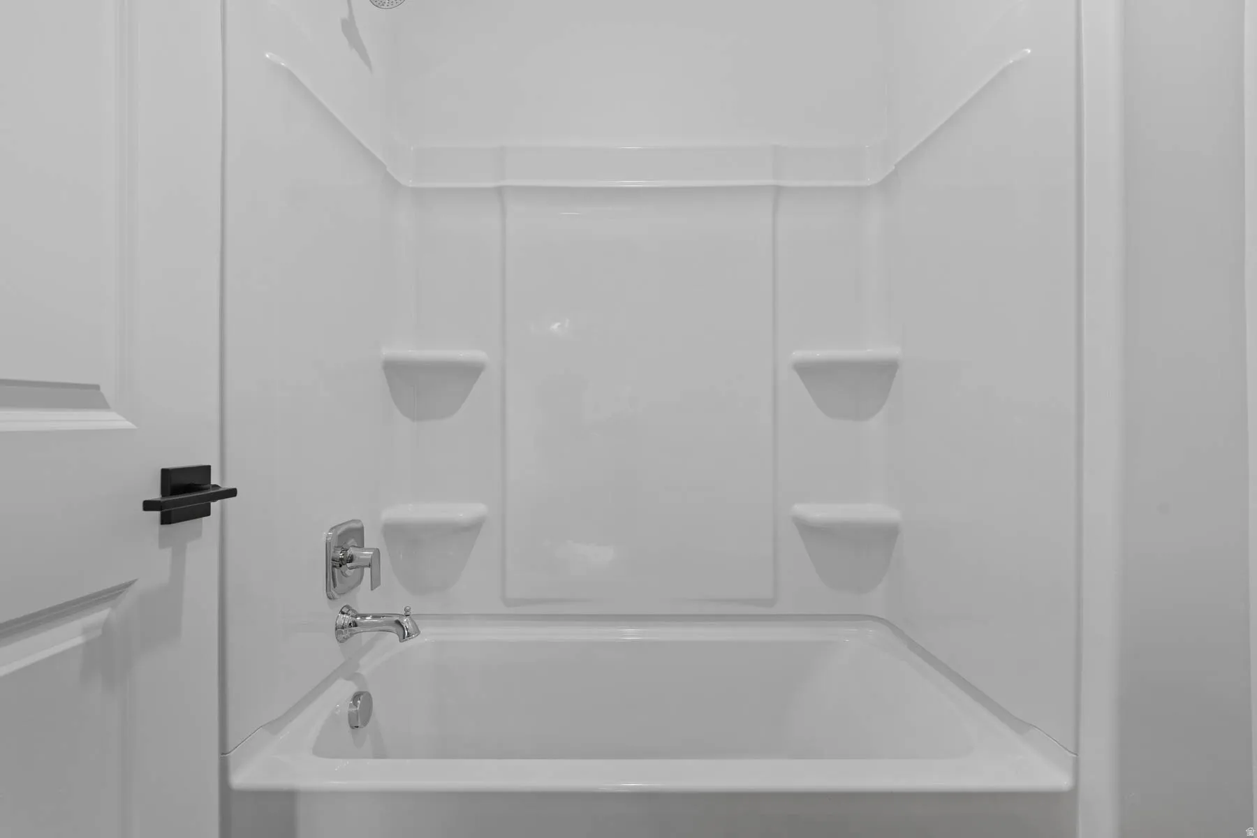 Bathroom with shower / washtub combination