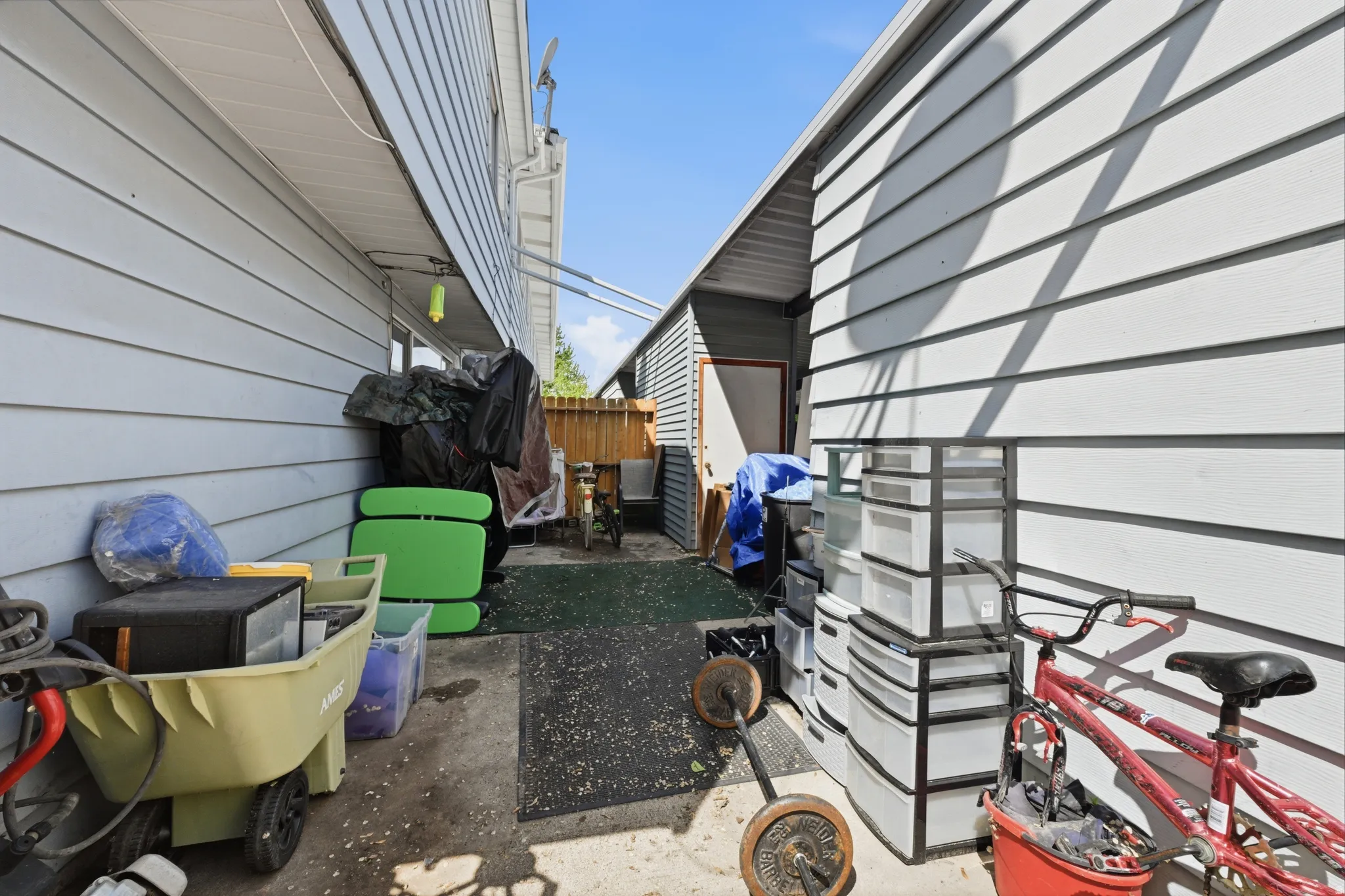 View of patio with area and storage shed