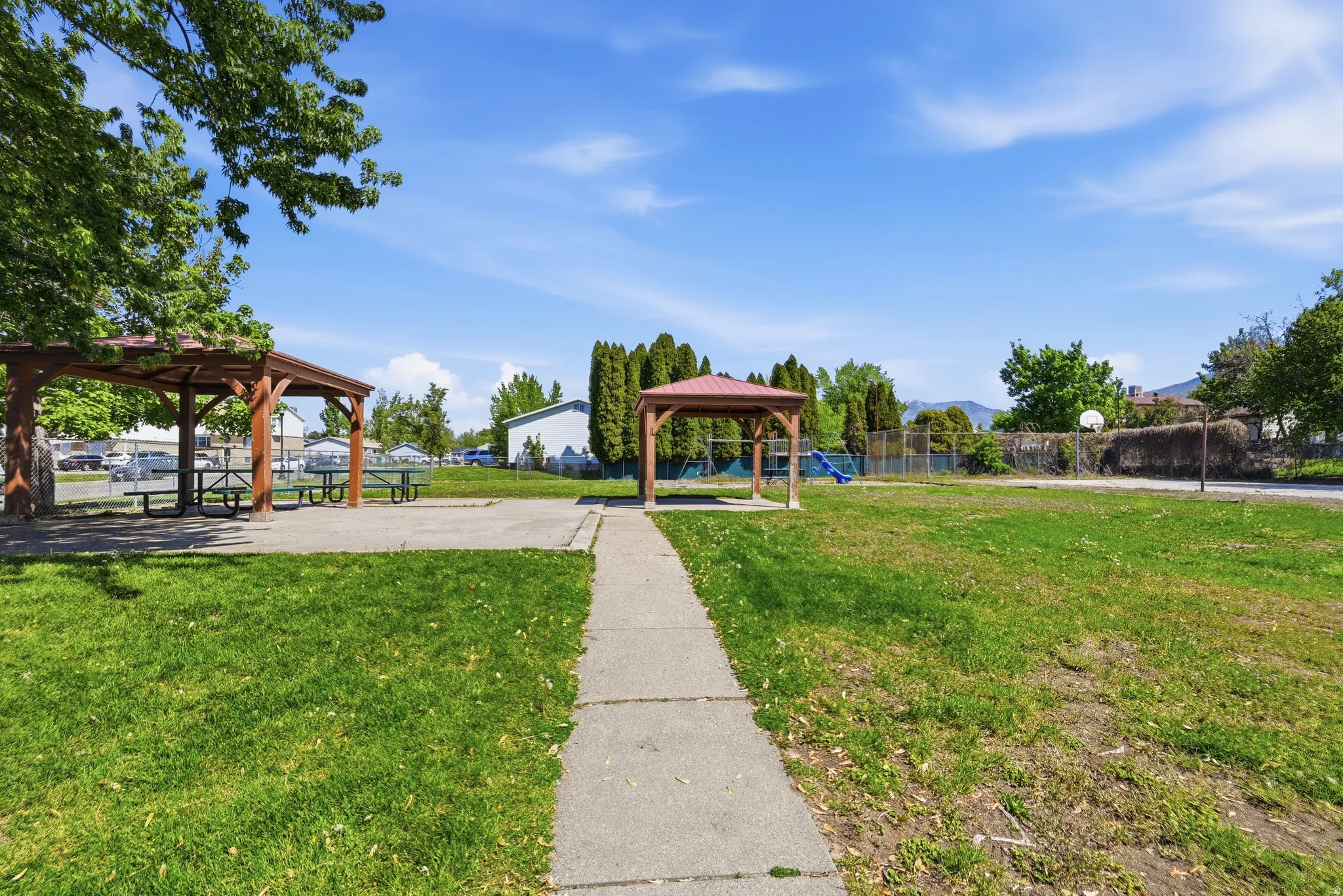 View of community featuring a gazebo and community basketball court