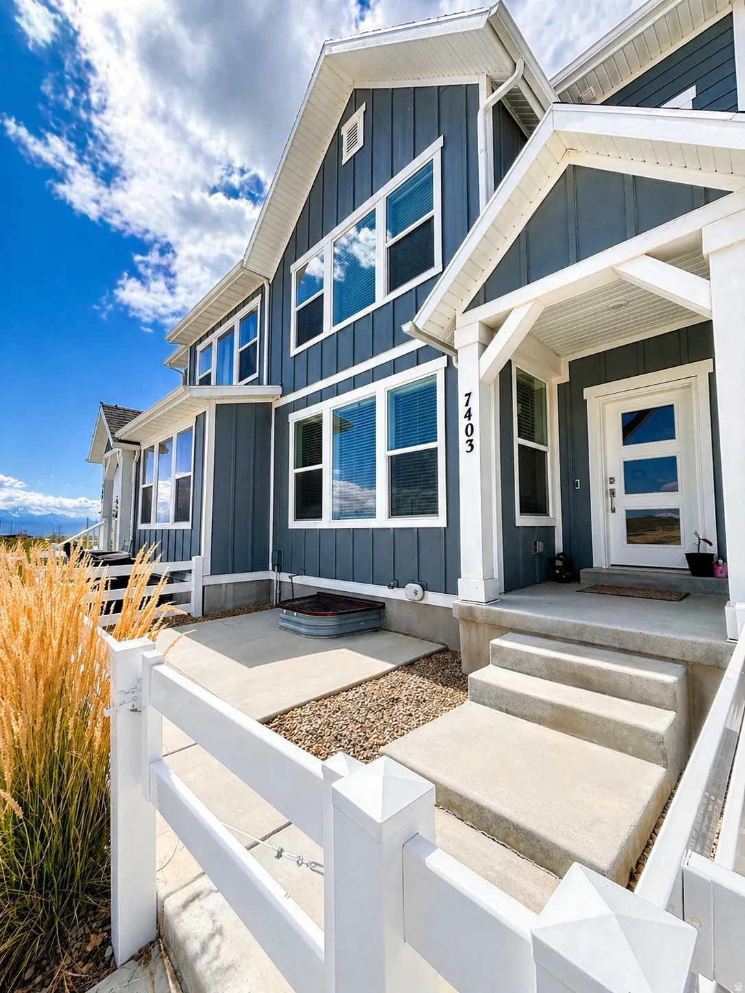 View of front facade featuring board and batten siding
