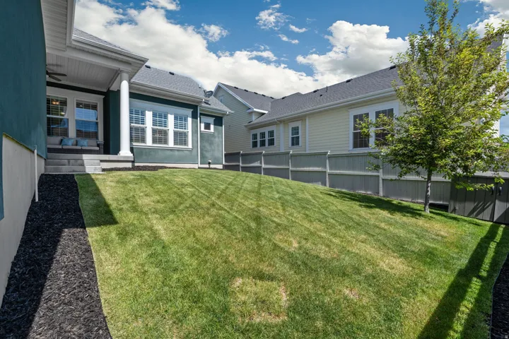 View of yard with ceiling fan