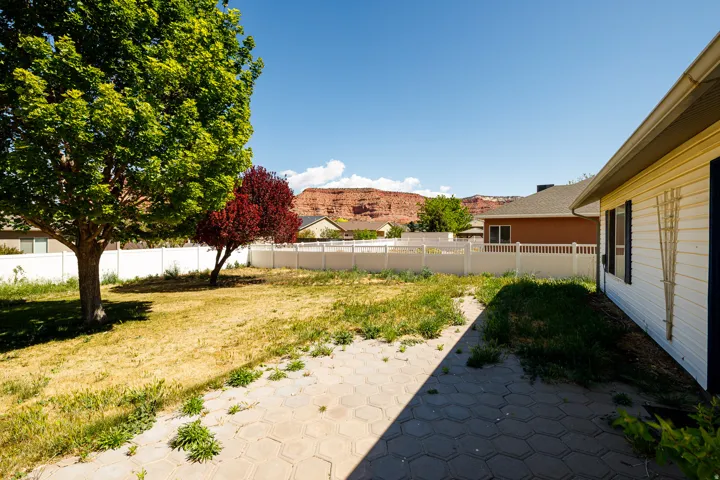 View of fenced backyard