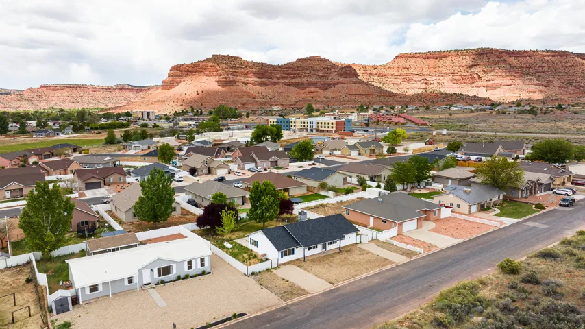 Aerial perspective of suburban area featuring mountains
