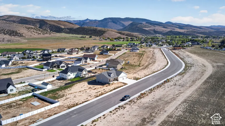 Developing residential area with established homes and new construction sites