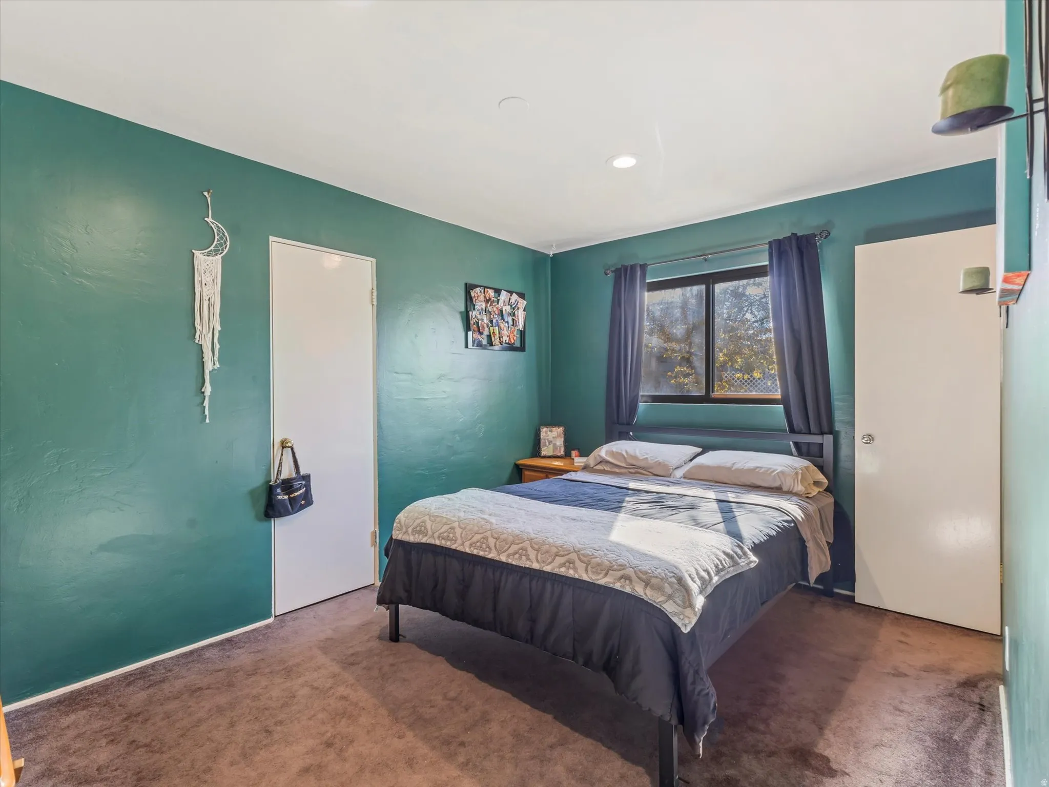 Bedroom featuring carpet flooring