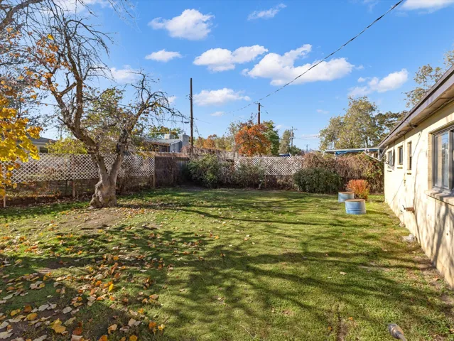 View of fenced backyard