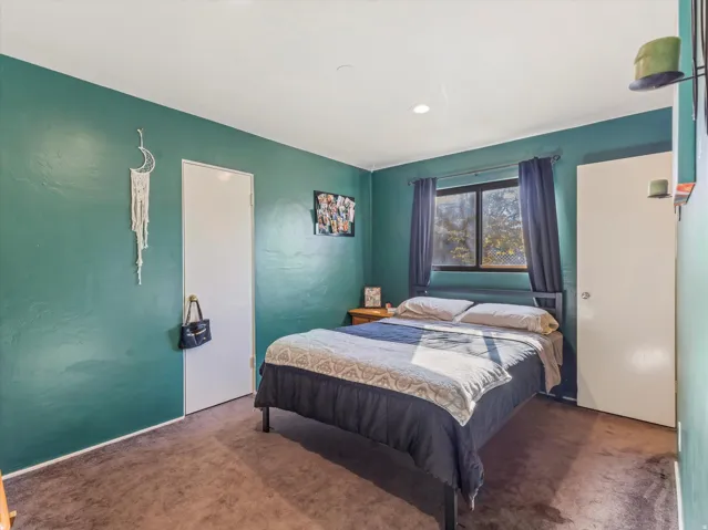 Bedroom featuring carpet flooring