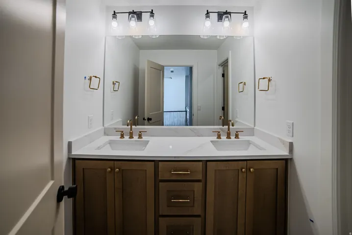 Bathroom featuring double vanity