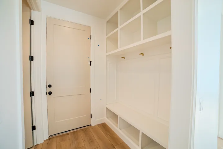 Mudroom featuring light wood-type flooring