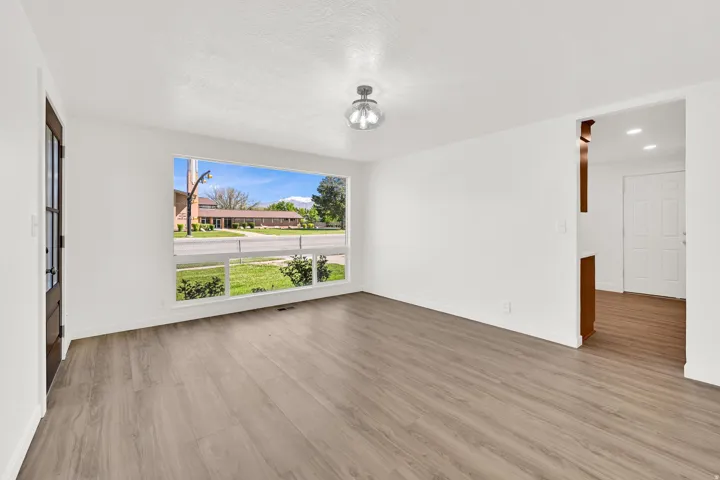 Spare room featuring light wood-style flooring