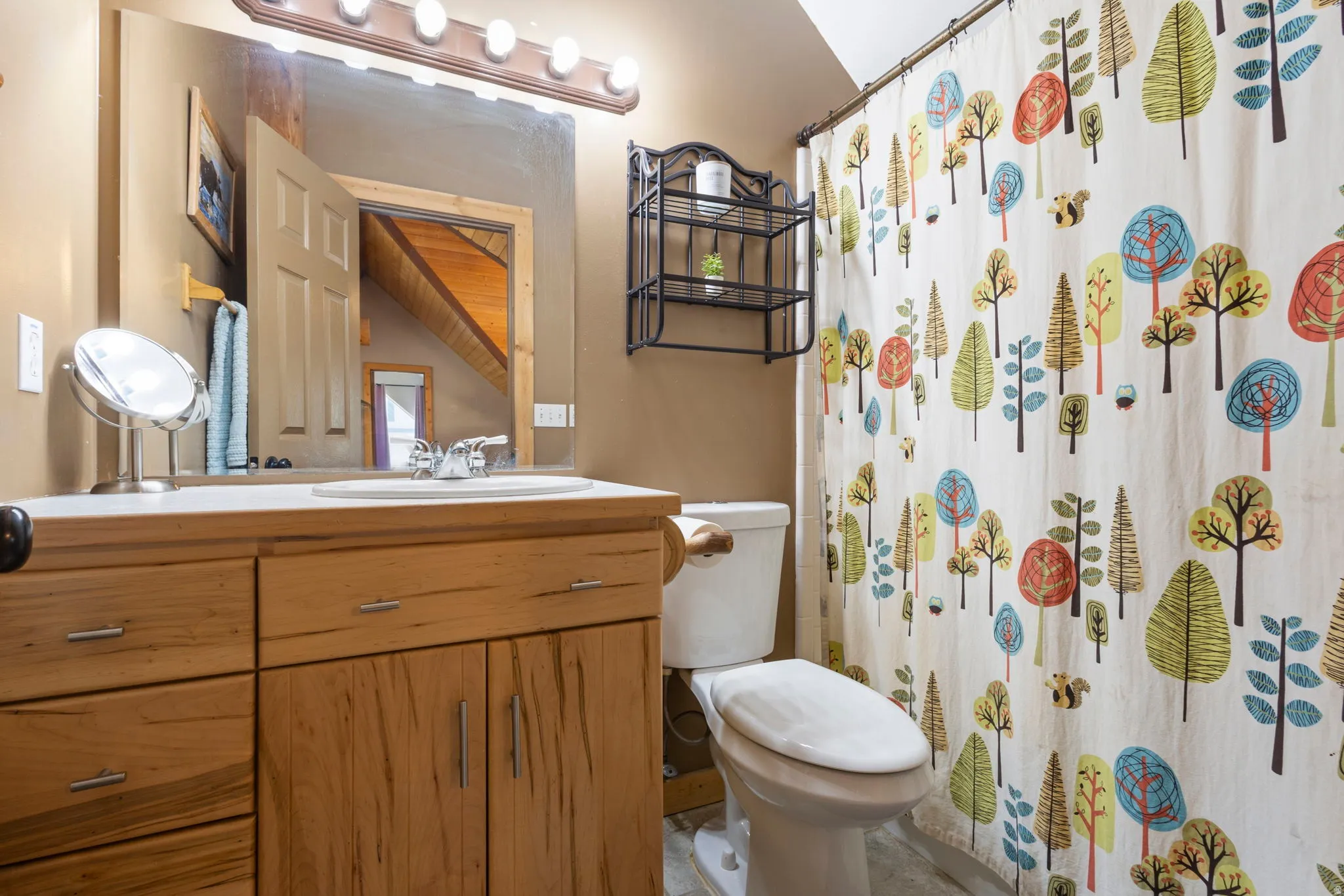 Bathroom with vanity and a shower with curtain