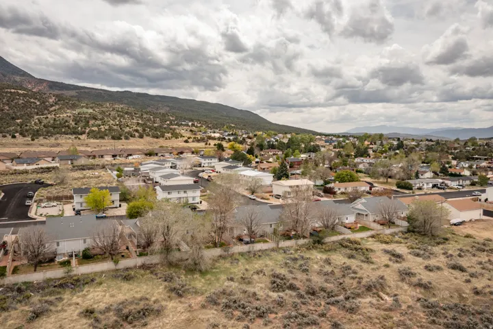 Residential neighborhood featuring multiple single-story and multi-story homes with varied rooflines