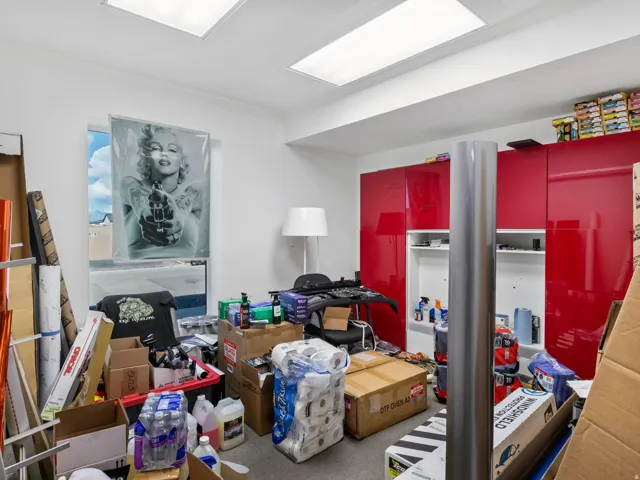 Room featuring white walls, recessed ceiling lighting, and a single window
