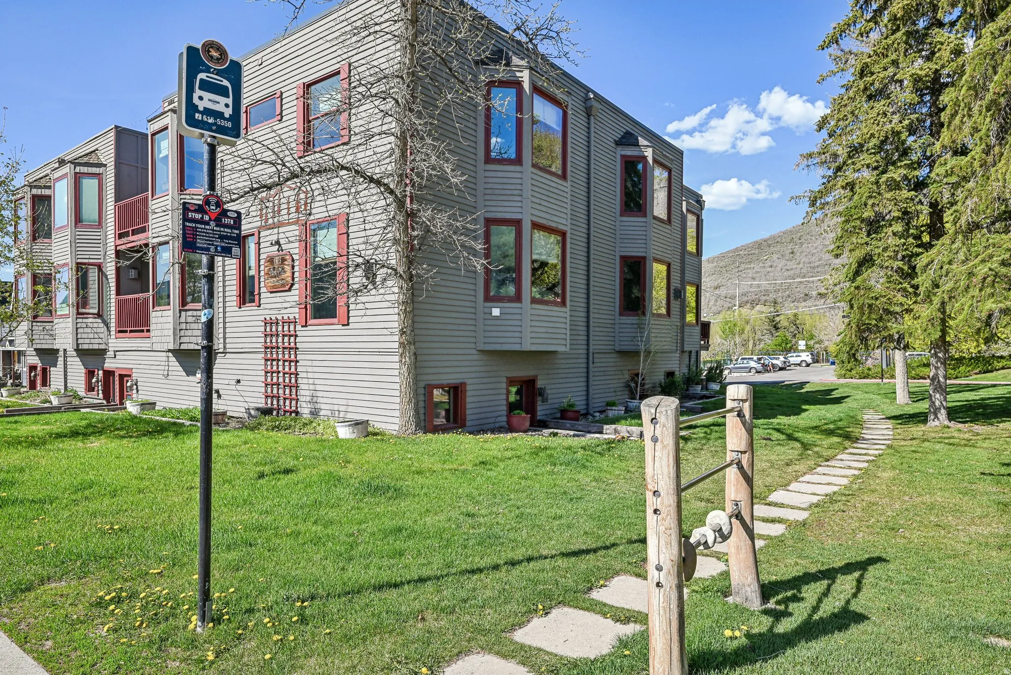 View of property exterior featuring a yard