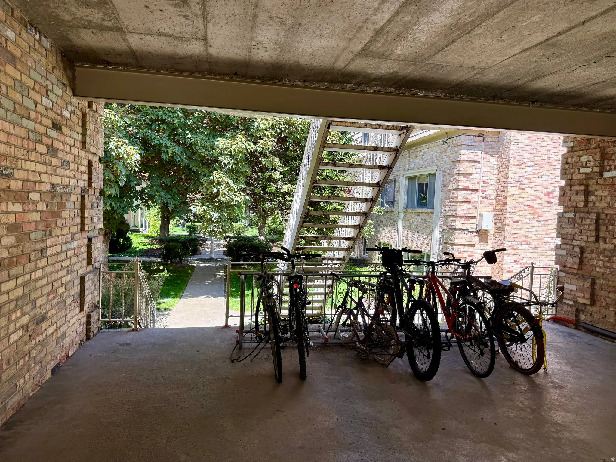 Terrace featuring stairway and bike racks