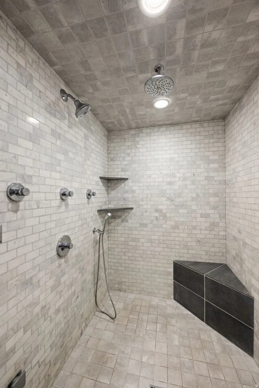 Bathroom with a tile shower