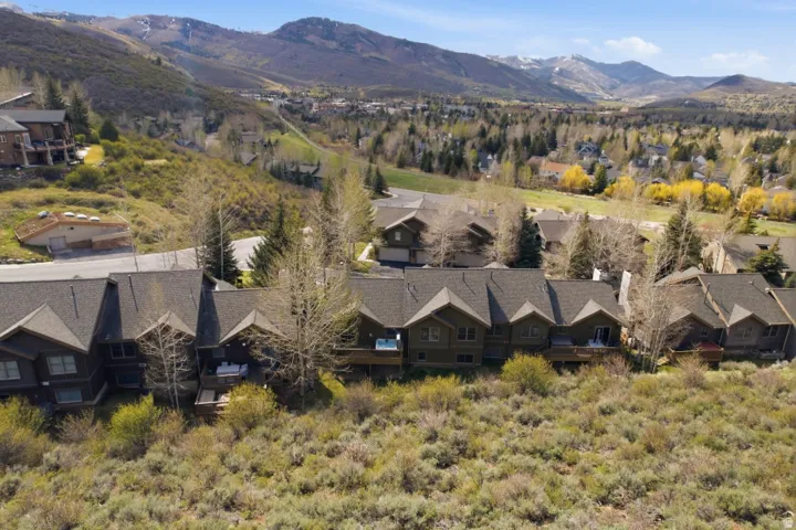 Aerial view of residential area with mountains