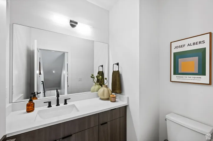 Half bath with toilet and vanity