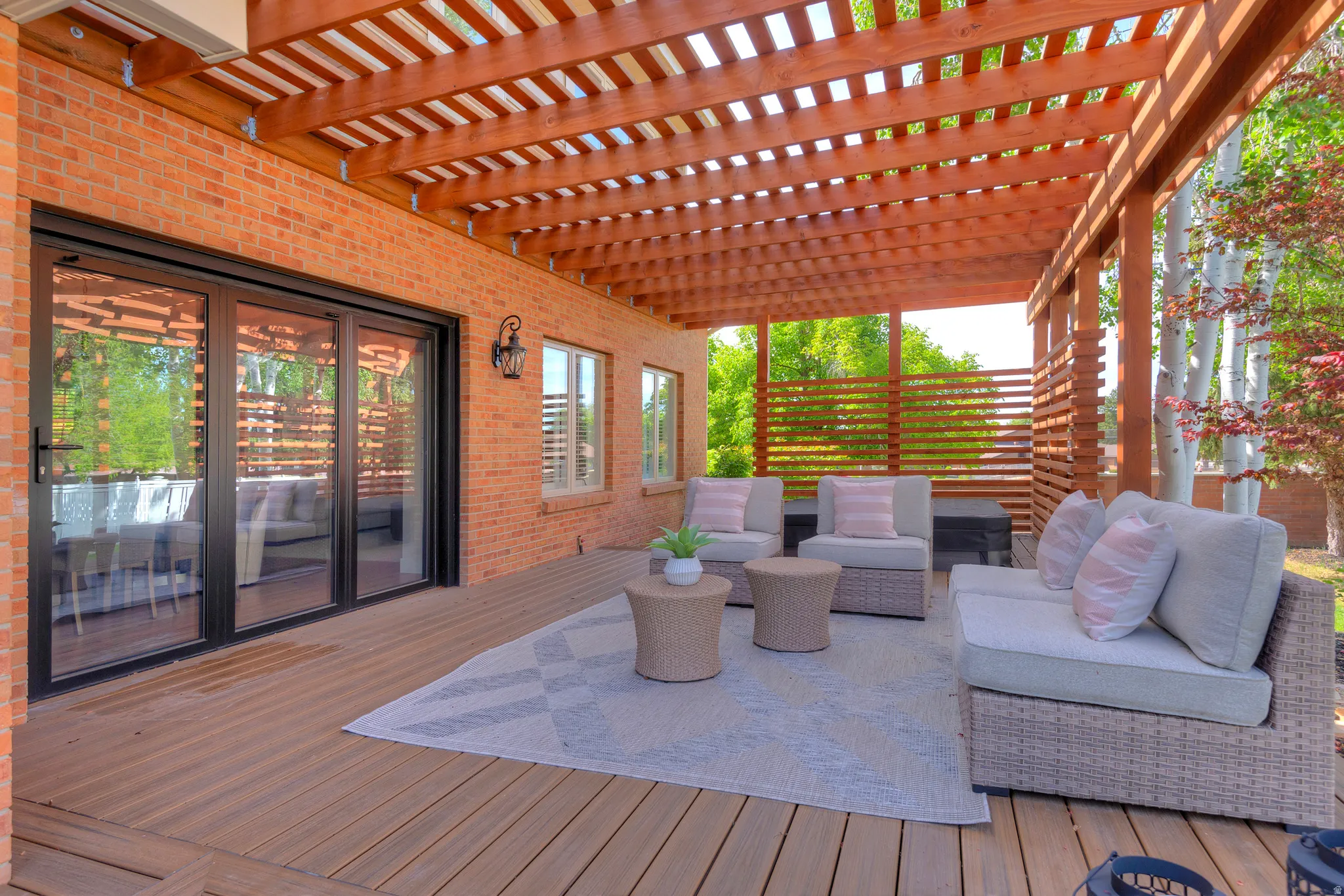 Entertain on the walkout terrace with an outdoor living space and a pergola