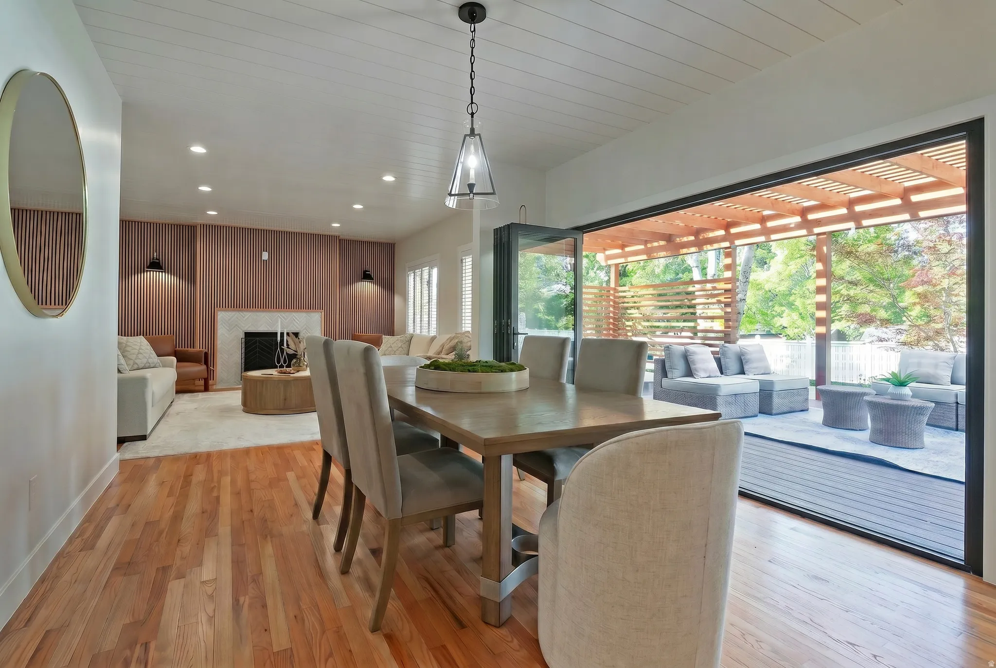 Dining room with accordion style doors to incorporate the indoor/outdoor entertaining feature.